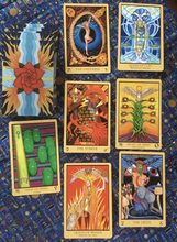 Load image into Gallery viewer, Rosetta Tarot 7 cards facing up with some cards facing down on a blue patterned background
