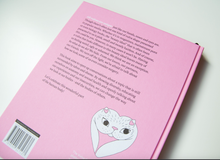 Load image into Gallery viewer, A Celebration of Vulva Diversity back of book lying on a white background
