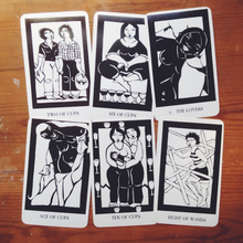 Load image into Gallery viewer, Thea's tarot cards 6 cards laying face up in a 2x3 grid on a wood background
