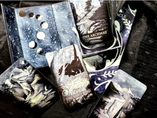 Load image into Gallery viewer, Open Endless Oracle box showing the cards inside with three cards arranged below on a black background