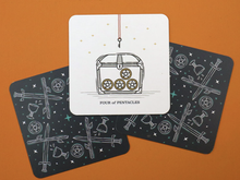 Load image into Gallery viewer, 3 Trinity Tarot cards are on an orange background. 2 cards are facing down and the 4 of pentacles card is in the middle and facing up