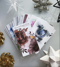 Load image into Gallery viewer, Radiant Crystal cards 2nd edition cards fanned out on a white background
