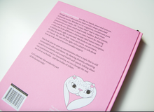 Load image into Gallery viewer, A Celebration of Vulva Diversity back of book lying on a white background
