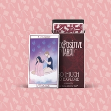 Load image into Gallery viewer, Sex Positive Tarot box with card partially out 8 of consent care leaning against the box and all on a printed pink background
